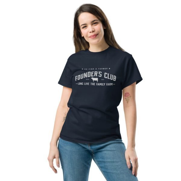 Woman wearing navy blue Founder's Club T-shirt with text: "Go Find a Farmer - Founder's Club established 2025 - Long live the family farm" and a small cow silhouette