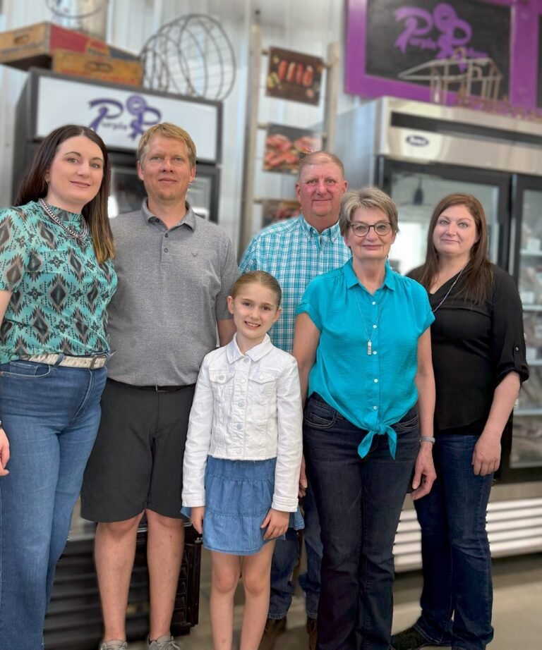 Hunter Recknor Family in Farm Store Large 768x922
